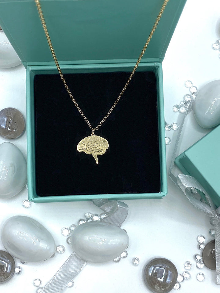 Gold Brain Stem Pendant Necklace - A stylish and meaningful accessory showcasing an intricate design, perfect for those with a passion for neuroscience and biology