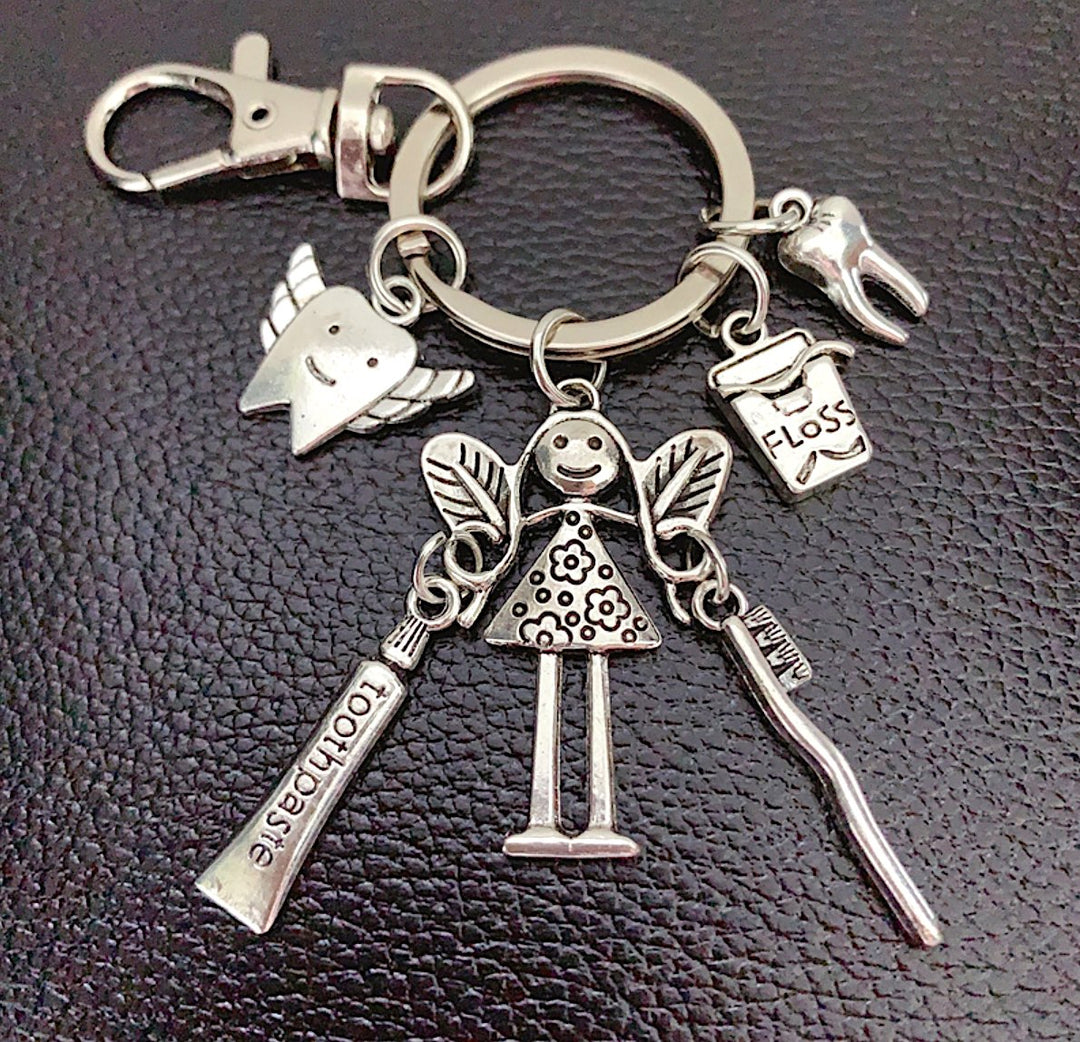 Tooth Fairy keyring and charms, perfect for educators promoting dental health among children.