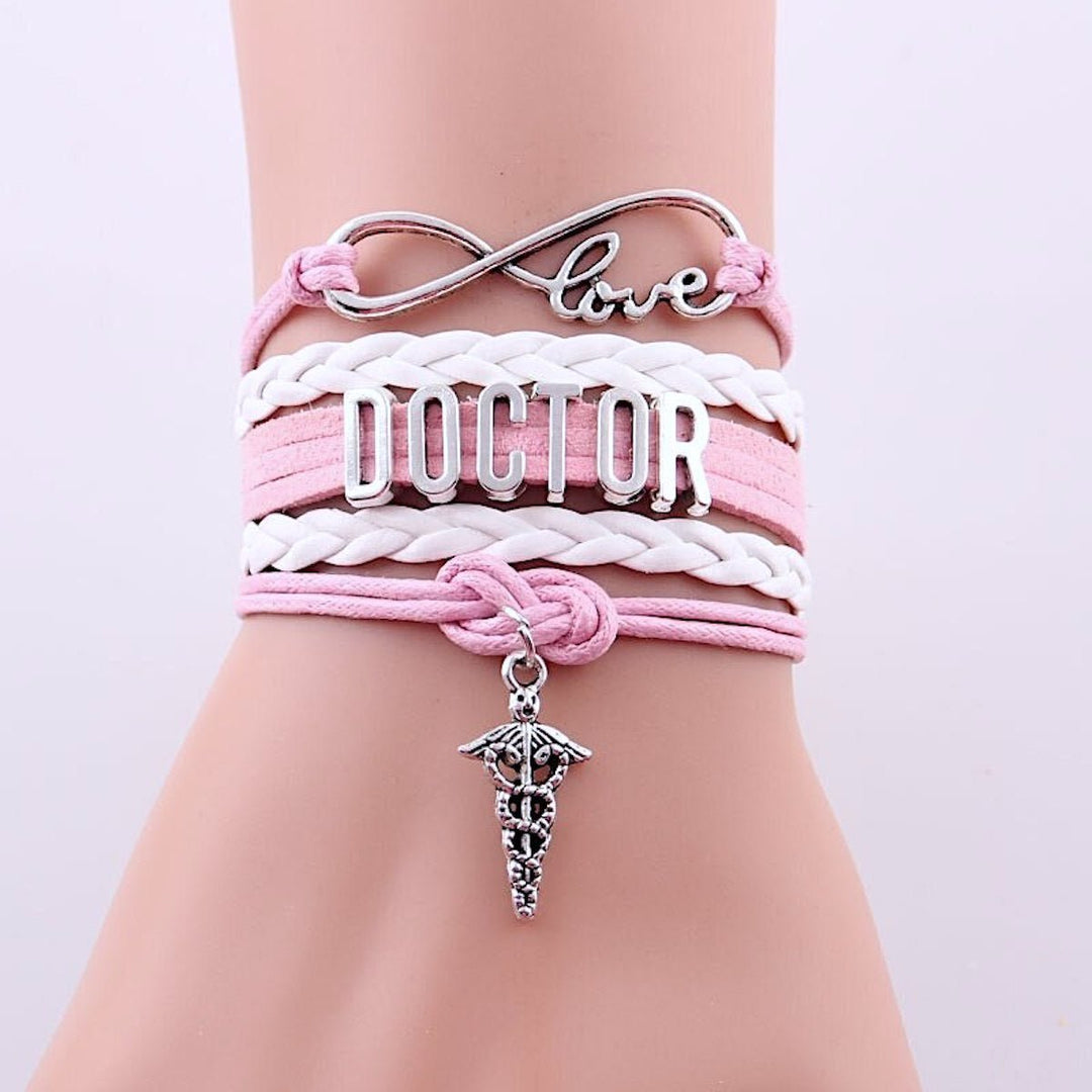 Charming Doctor Infinity Wrap Bracelet in pink, symbolizing the eternal dedication of healthcare professionals, featuring a delicate design perfect for nurses, doctors, and medical enthusiasts.