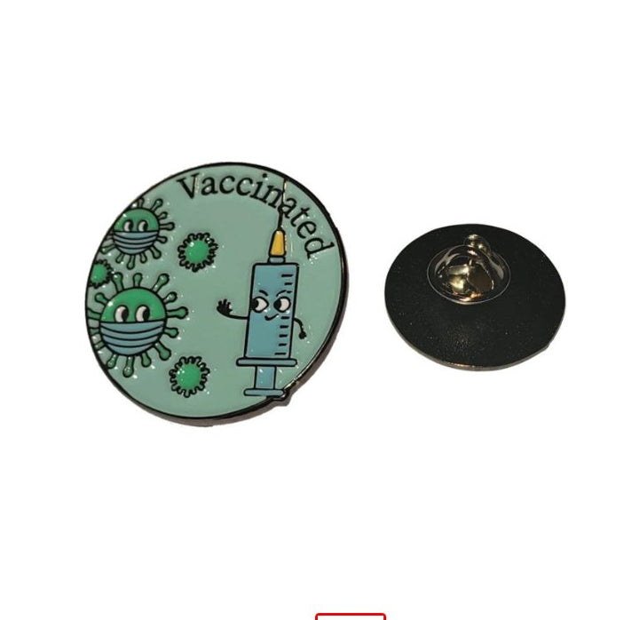 Green Vaccinated Lapel Pin, a stylish accessory to show support for vaccination and public health awareness.