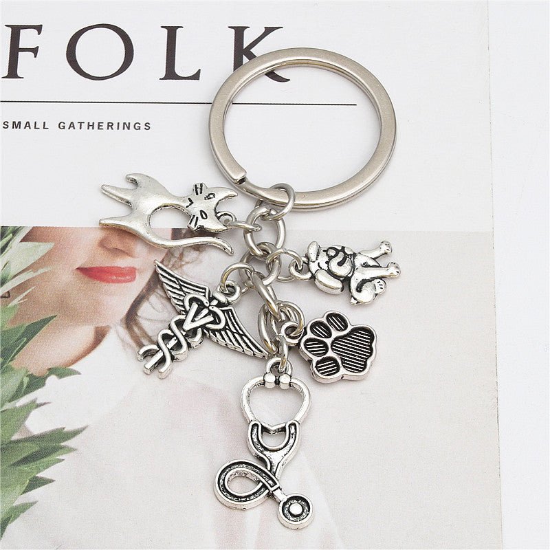 Veterinary Caduceus Cat Dog Keyring featuring a unique design symbolizing the bond between pets and veterinary care.