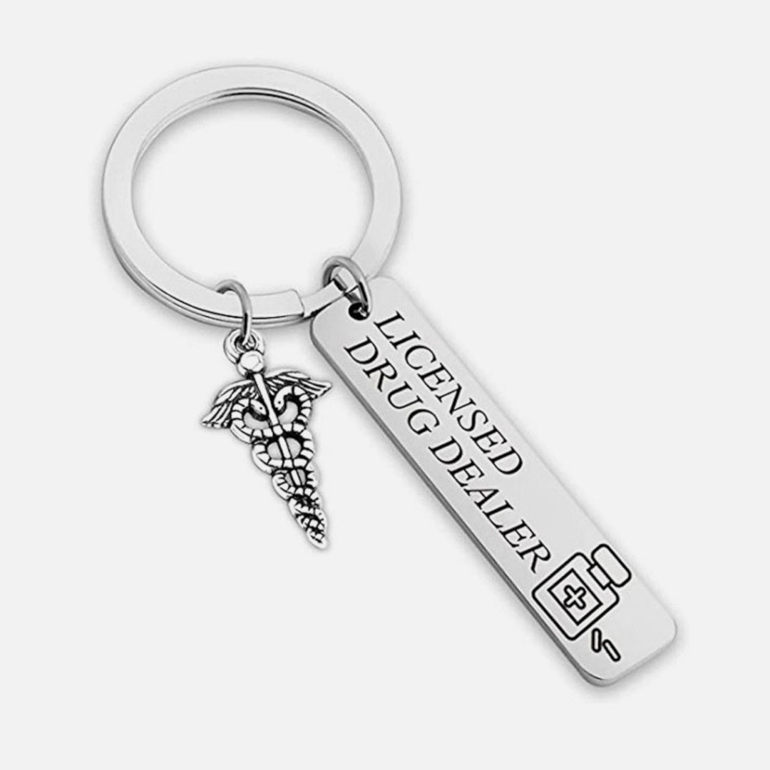 Licensed Drug Dealer Caduceus keyring featuring a humorous design perfect for medical professionals and pharmacy enthusiasts.