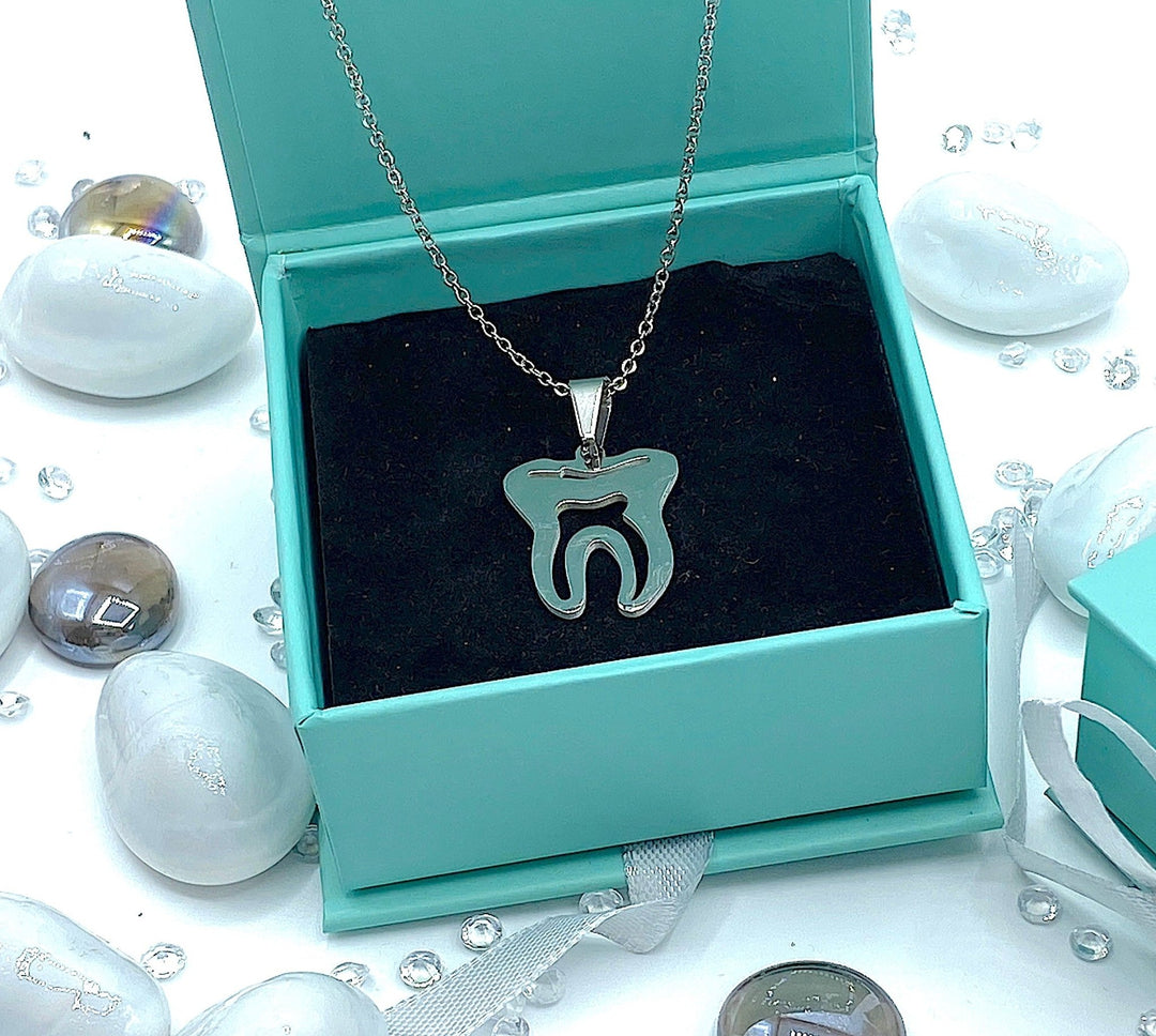 Silhouette Tooth Dentistry Necklace - Elegant dental-themed necklace featuring a stylish silhouette of a tooth, perfect for dentists, dental hygienists, or anyone passionate about dentistry.