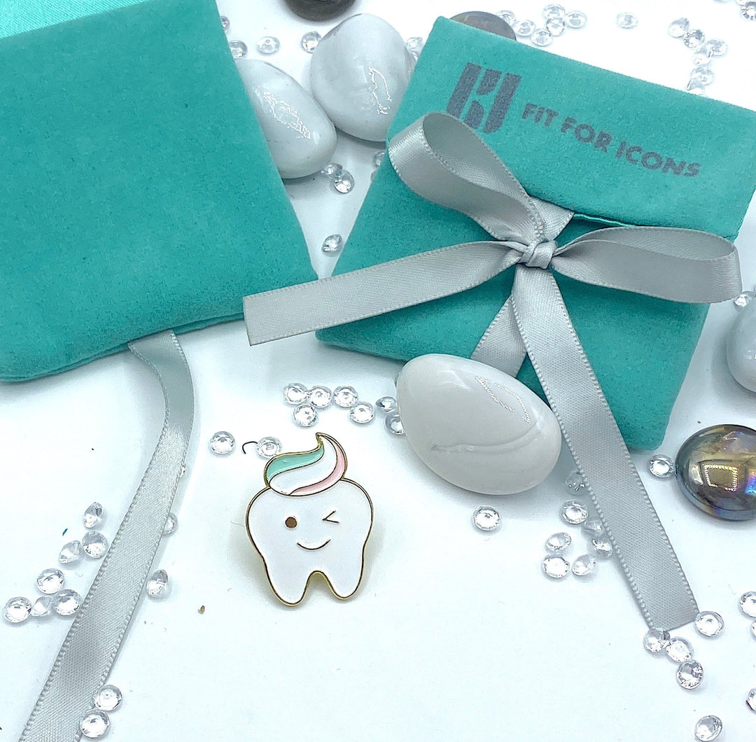 Tooth & Stripey Toothpaste Lapel Pin Brooch - A stylish accessory featuring a playful tooth and striped toothpaste design in white gold, perfect for dental professionals and enthusiasts.