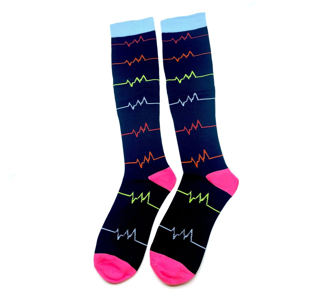 Lightweight everyday compression socks in black, blue, and pink ECG design, providing comfort and support for daily activities