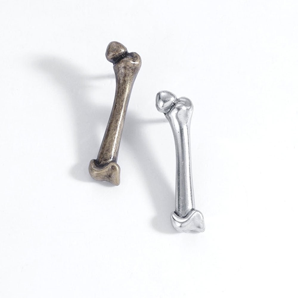 Antique gold femur bone lapel pin brooch, a unique accessory for healthcare professionals to showcase their passion for anatomy and medicine.