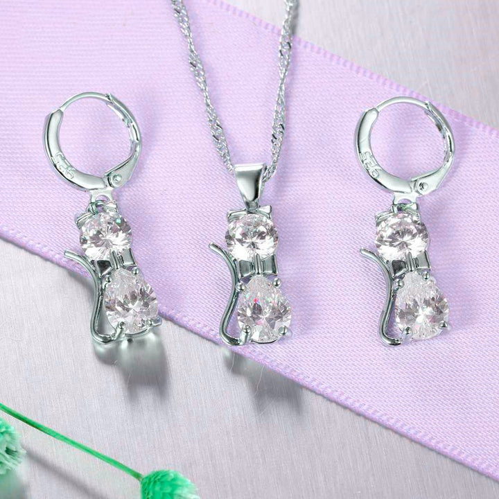 Elegant silver-plated crystal cat pendant and earrings set, perfect for pet lovers and social care professionals celebrating their love for animals.