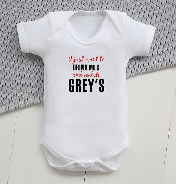 Grey's Anatomy baby vests featuring playful medical-themed designs, perfect for little ones of healthcare professionals or as a charming gift for new parents in the medical field.