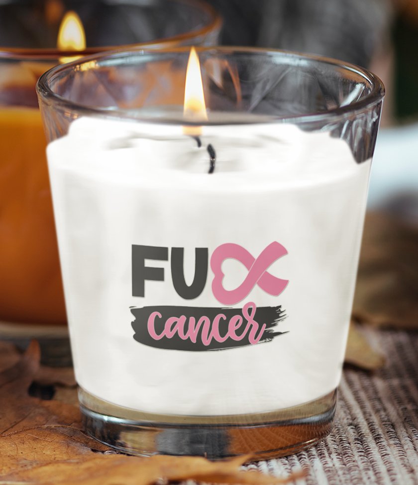 'FU** Cancer' scented candle, featuring bold lettering and a soothing fragrance, designed to inspire strength and empowerment in the fight against cancer.