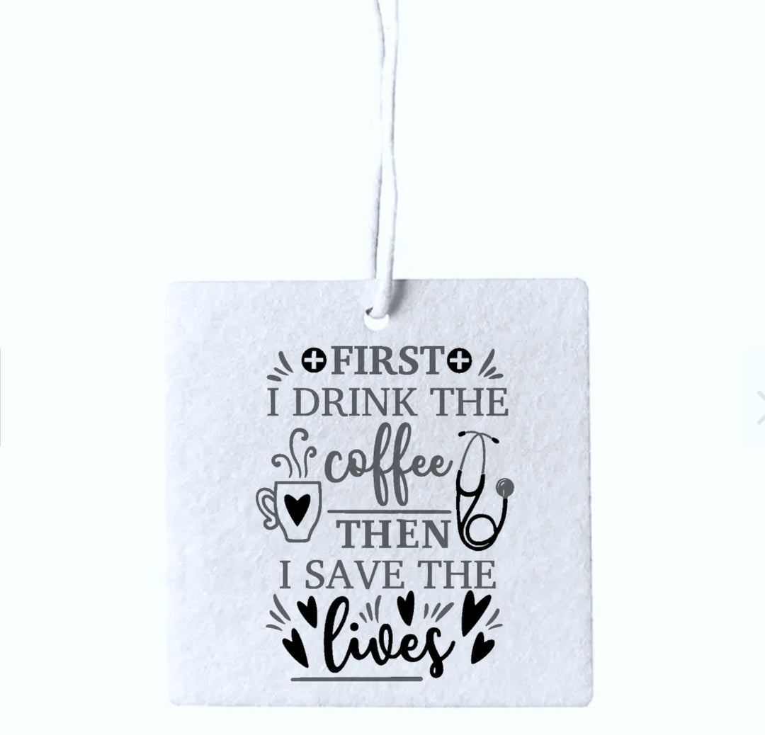 Set of three 'First I Drink Coffee' air fresheners, perfect for health and education professionals to enjoy a refreshing coffee scent in their workspace.