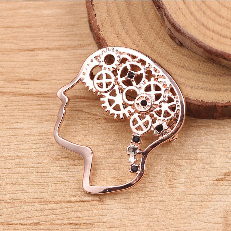 Brain Cog Wheel Lapel Pin Brooch in Rose Gold - A stylish accessory for healthcare professionals, educators, and social care workers, symbolizing creativity and intelligence.