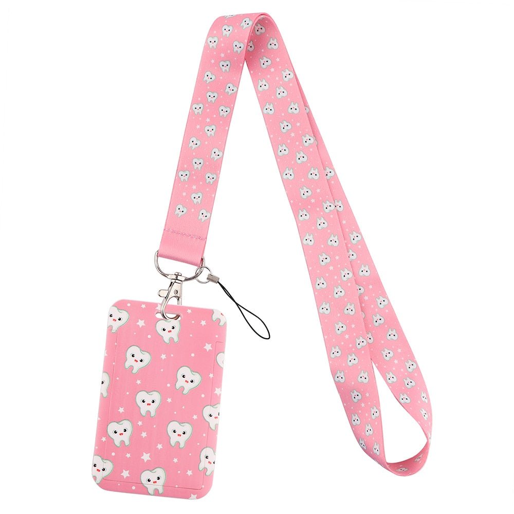 Dentistry Tooth Star Design Lanyard & ID Card Holder - A stylish lanyard featuring a fun tooth and star print, complete with a secure ID card holder, perfect for dental professionals to keep their IDs accessible.