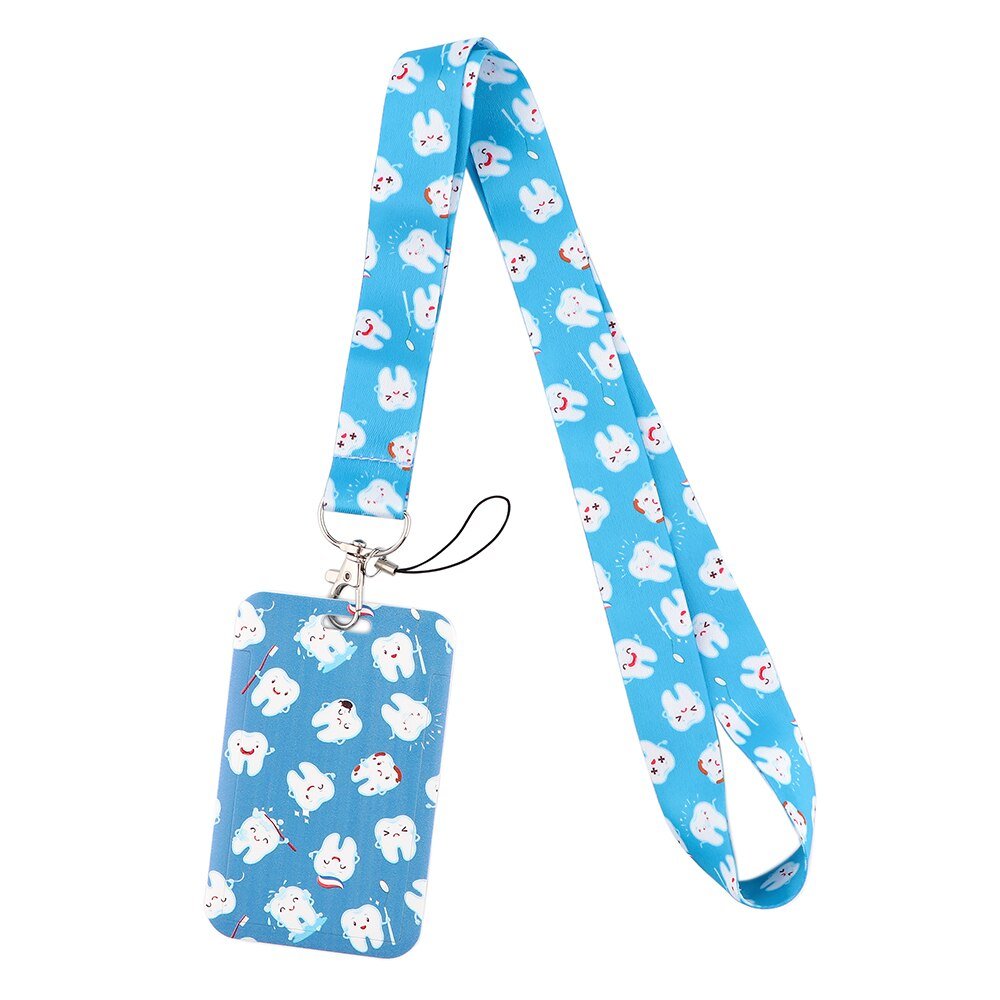 Dentistry Tooth & Toothpaste Lanyard & ID Card Holder - A colorful lanyard adorned with tooth and toothpaste designs, perfect for dental professionals to display their ID badges in a fun and engaging way.