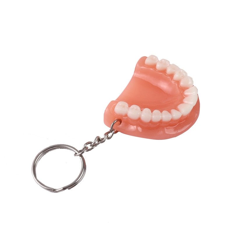 Dentures False Teeth Dentist Keyring - A quirky keyring shaped like false teeth, perfect for adding a fun touch to your keys or as a delightful gift for dental professionals and enthusiasts.