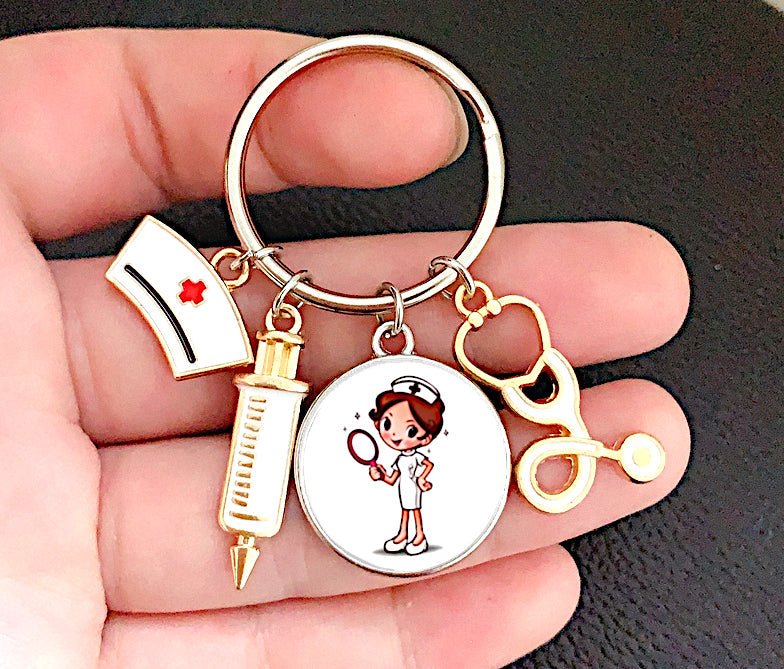 Nurse Image Cabochon Keyring featuring a beautiful gold, silver, and white design, showcasing a captivating nurse-themed image encapsulated in a round cabochon, perfect for celebrating the nursing profession.