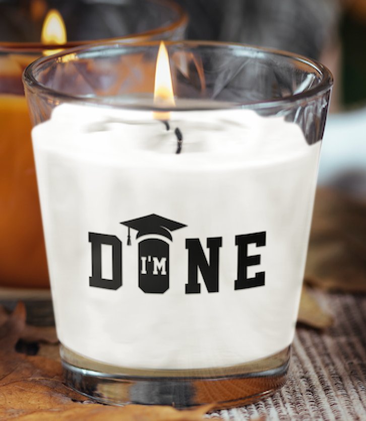 I'm Done Graduation Scented Candle, featuring a playful and celebratory design that encapsulates the joy of graduation. This scented candle emits a delightful fragrance, making it a perfect gift for graduates to commemorate their achievements and relax after a successful journey.