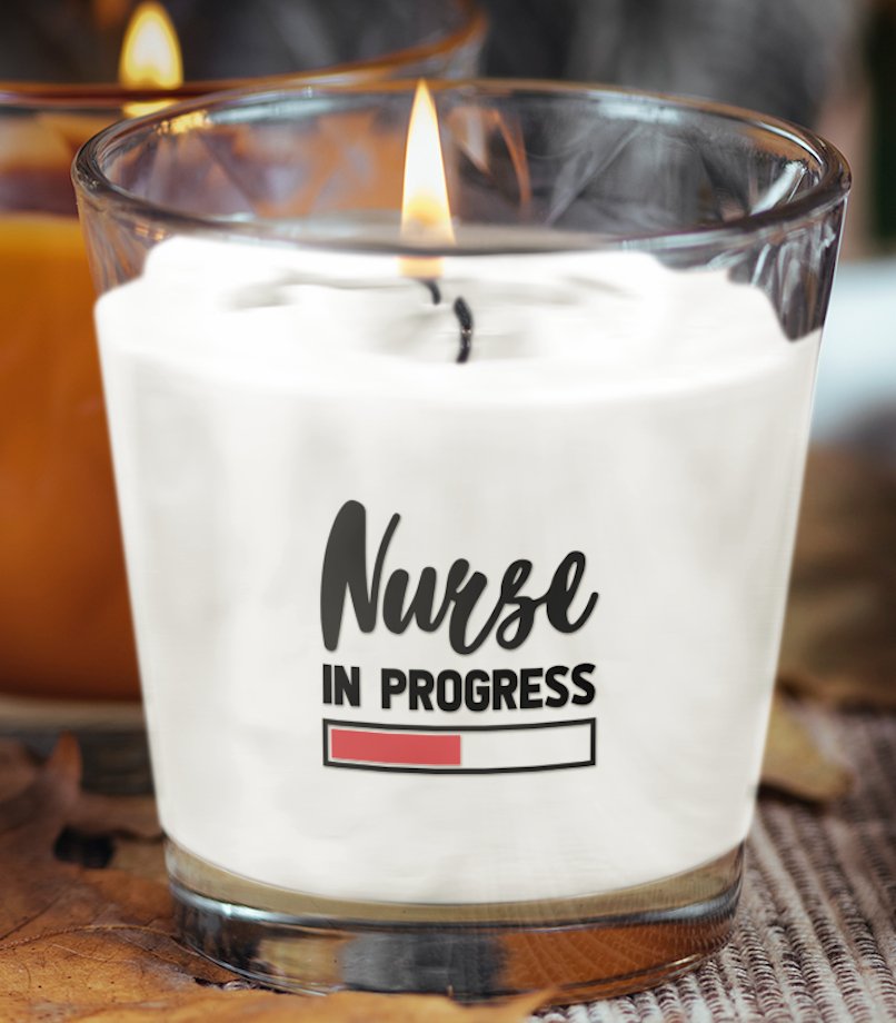 Nurse In Progress Scented Candle featuring a soothing fragrance, elegantly designed to celebrate and inspire healthcare professionals, perfect for creating a calming atmosphere.