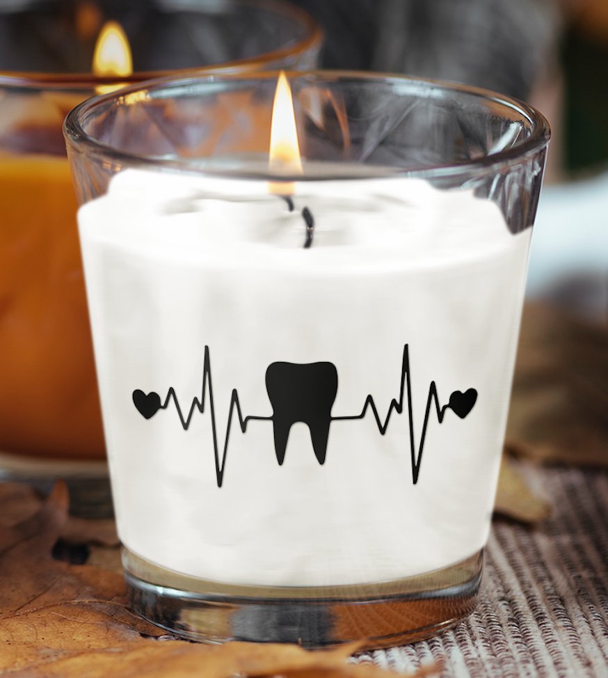 Tooth Heartbeat Design Scented Candle featuring a unique heartbeat graphic intertwined with a tooth motif, elegantly packaged for a stylish accent in any room.