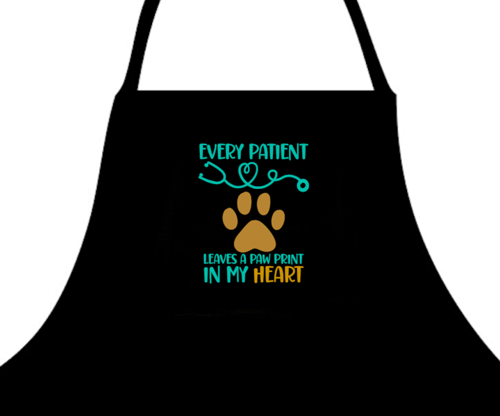 Every Patient Leaves A Pawprint Apron - A fun and functional apron featuring a heartwarming message, perfect for pet lovers and animal caregivers in veterinary settings.