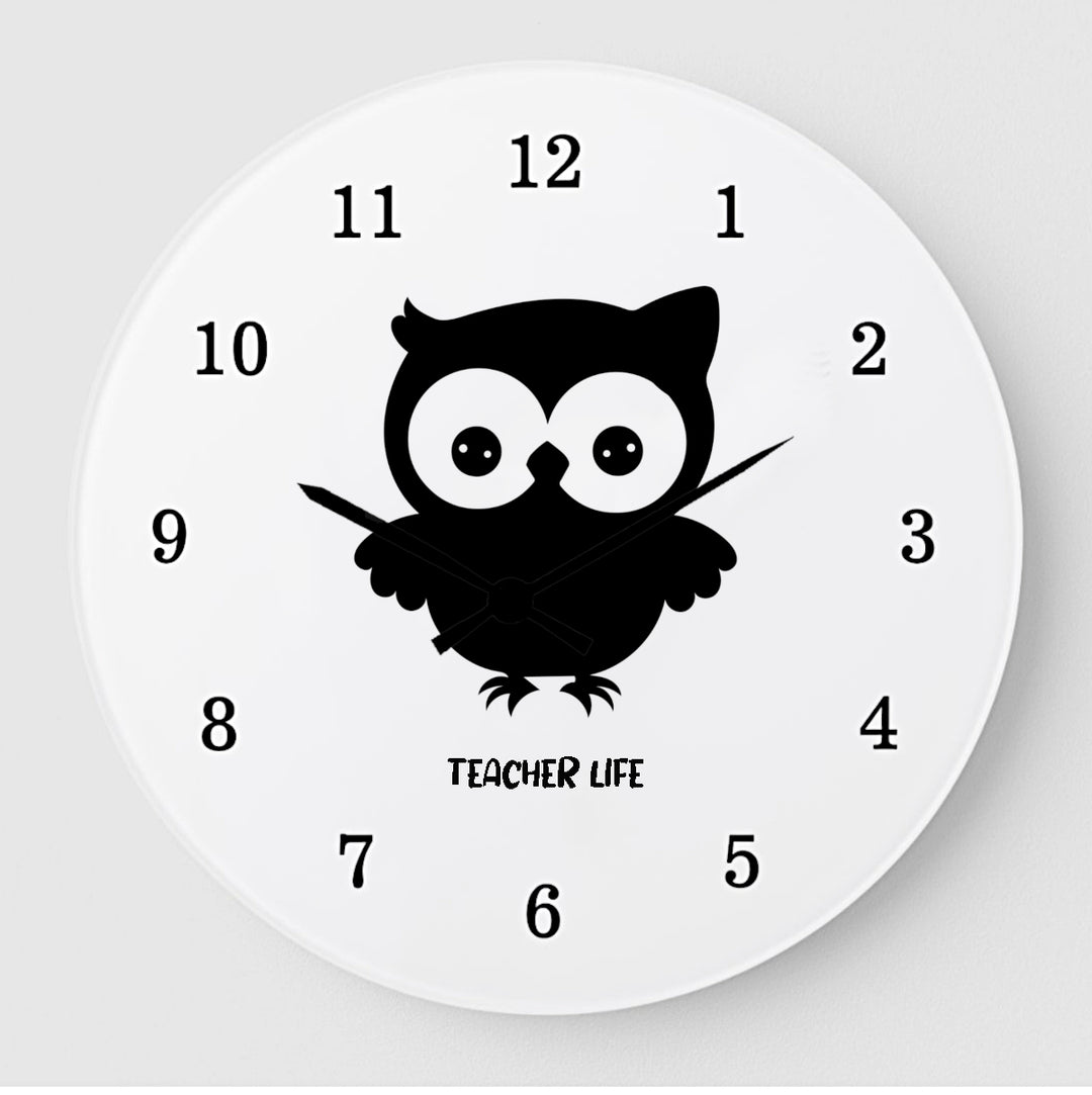 Teacher Life Owl Wall Clock - A whimsical wall clock featuring an adorable owl design, embodying the playful spirit of teaching while serving as a functional timepiece for any classroom or home.