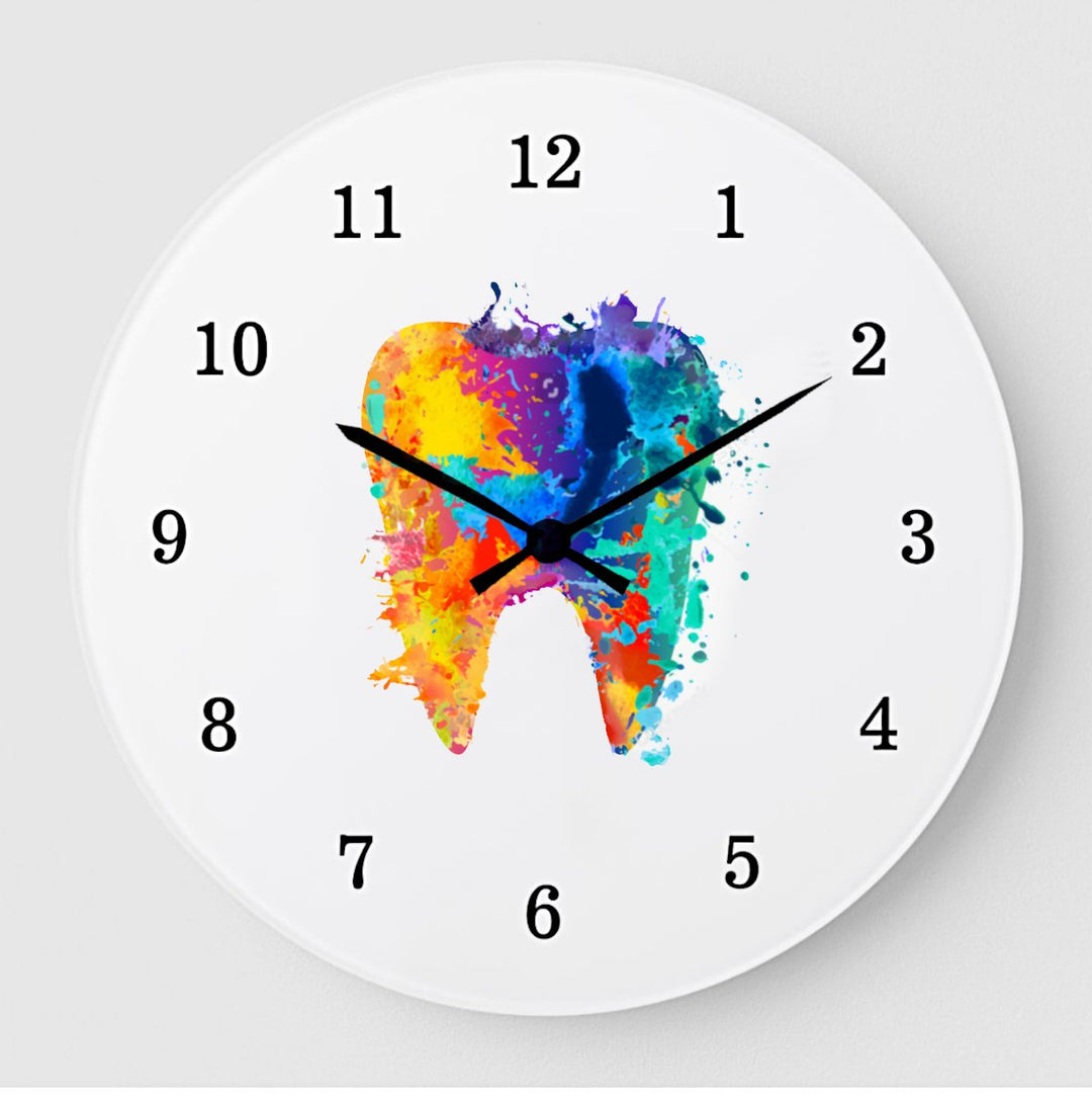 A colorful abstract wall clock featuring a tooth design in vibrant splashes of blue, orange, and purple. The clock has black hour and minute hands, with numbers 1 to 12 displayed around the edge. This clock is ideal for dental professionals.