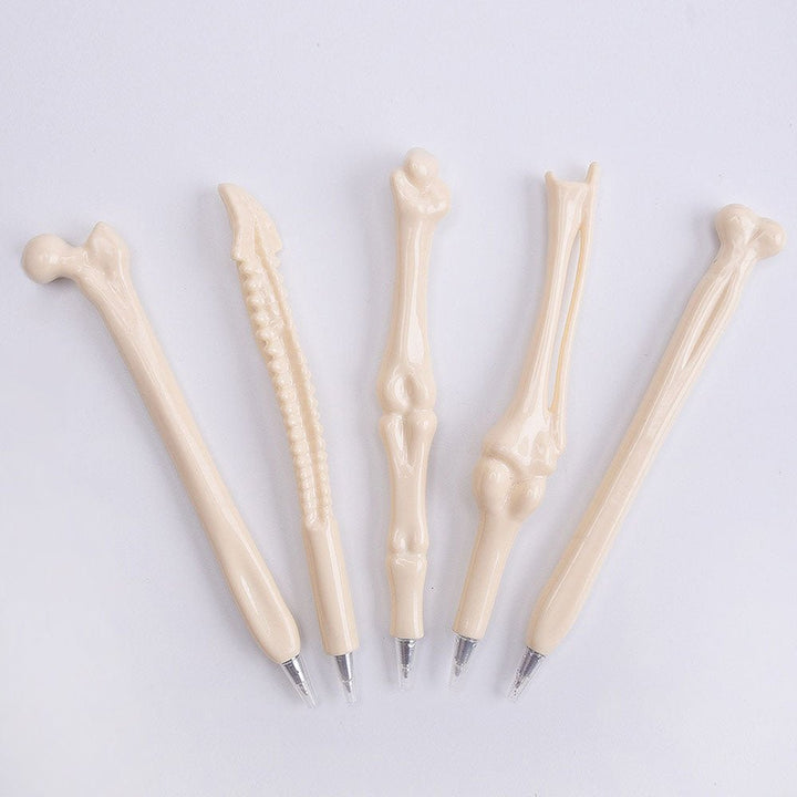 Anatomical bone-shaped pen designed to mimic the structure of a bone, resting on a white background. Ideal for medical professionals and anatomy students.