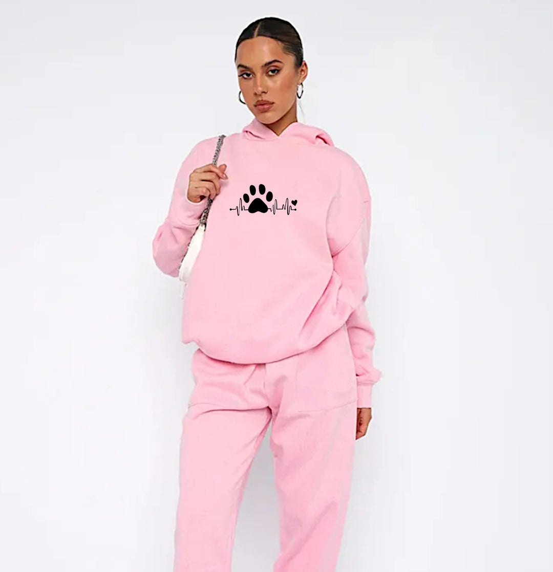 Cozy pink hoodie featuring a paw heartbeat design, perfect for veterinary professionals and animal lovers who want to showcase their passion in style.