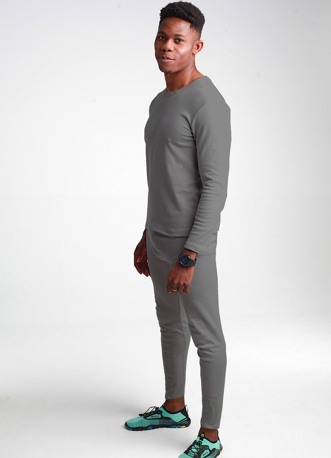 Men's Supreme-Soft Plus Thermal Base Layer Trousers in charcoal grey, designed for warmth and comfort. These lightweight, stretchy trousers feature a brushed interior, perfect for layering and outdoor activities in colder weather.