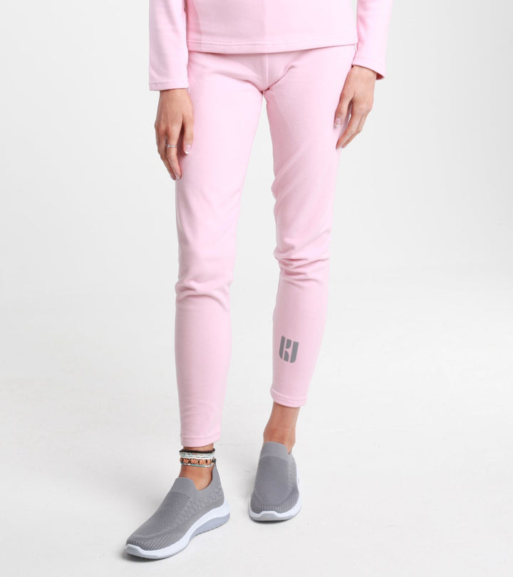 Women's Supreme-Soft Plus Thermal Base Layer Bottoms in Whisper Pink, featuring a soft and cozy design with four-way stretch, perfect for warmth and comfort in cold weather.