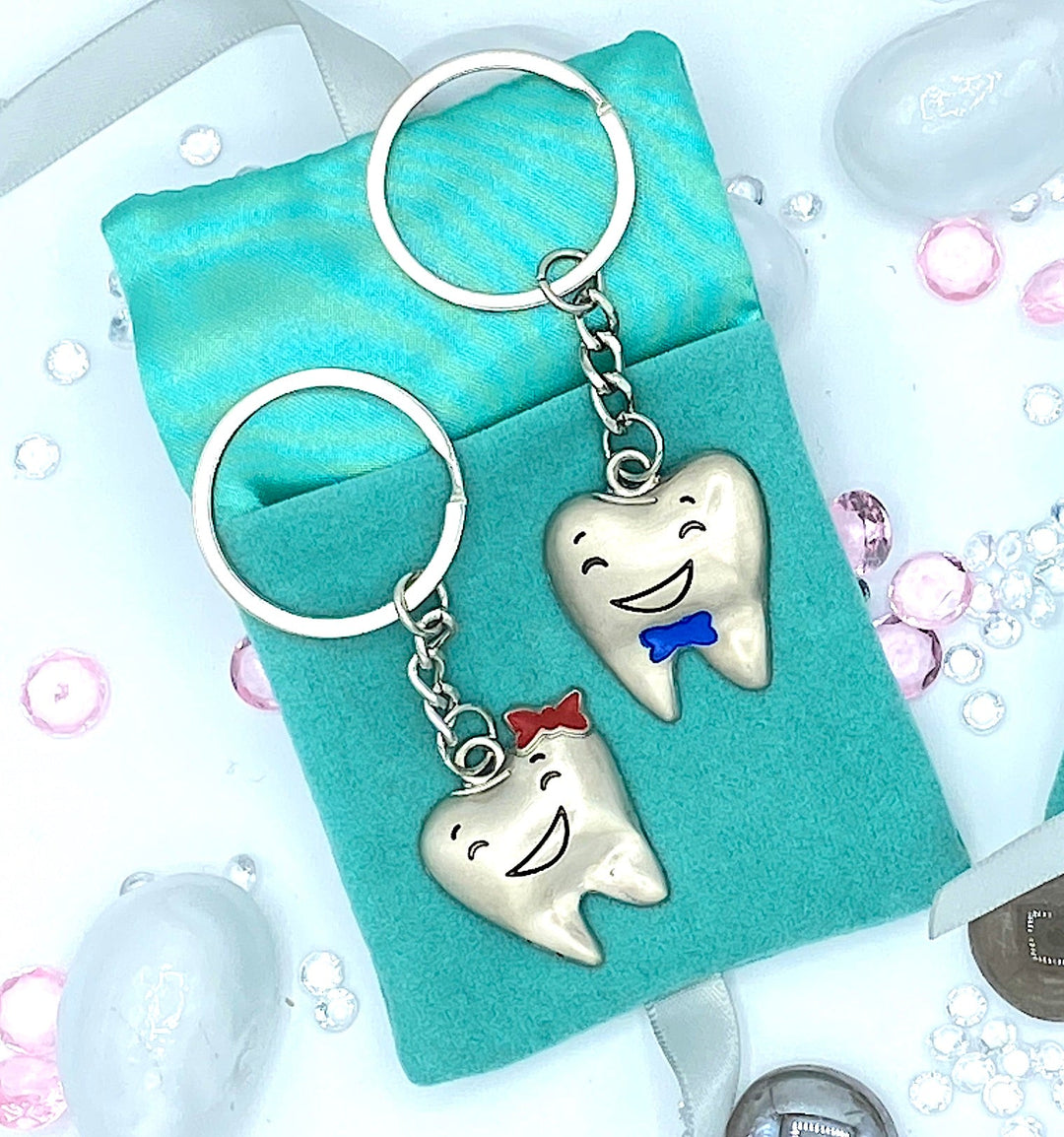 Smiley Tooth Blue Bow Tie Keyring - Fun accessory for dental professionals, perfect for personalizing keys or bags.