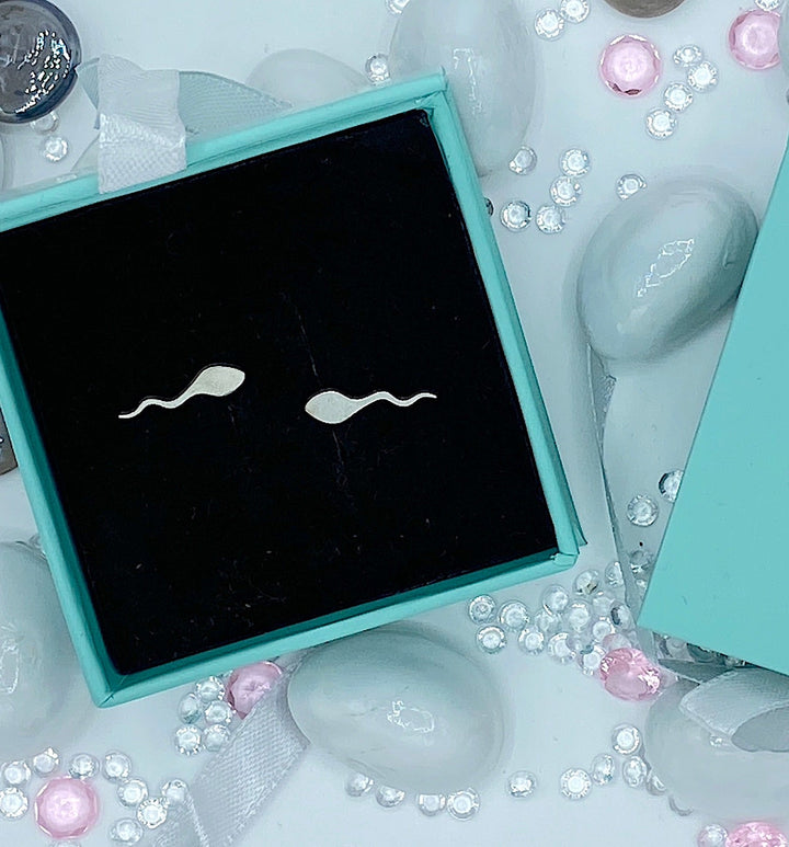 Silver sperm stud earrings, a playful and unique accessory for biologists, educators, and medical professionals.