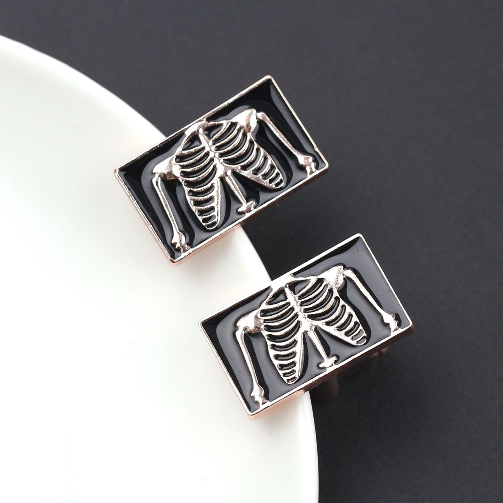 X-Ray Cufflinks in Black and Silver, featuring a stylish and modern design that showcases a unique x-ray motif, perfect for adding a touch of sophistication and personality to formal attire.